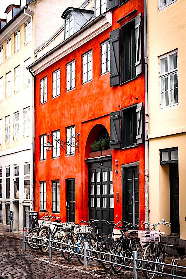 Colorful Copenhagen architecture and street scene with bicycles, ideal for exploring free things to do in the city